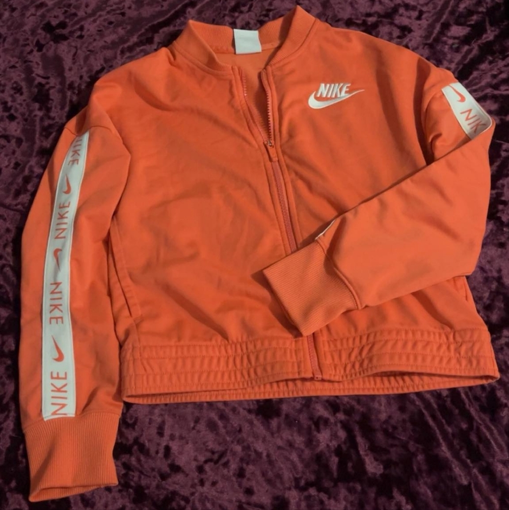 Orange Nike tracksuit top